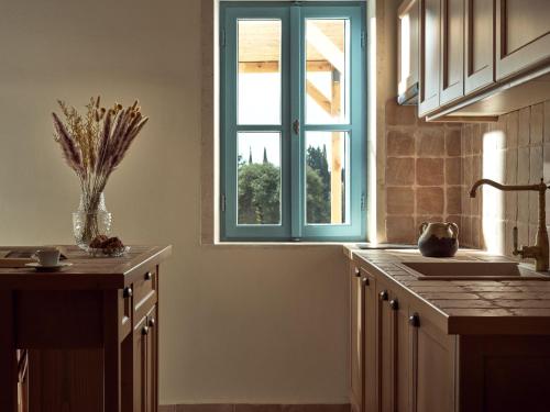 Dapur atau dapur kecil di Alkis Farm and Residence