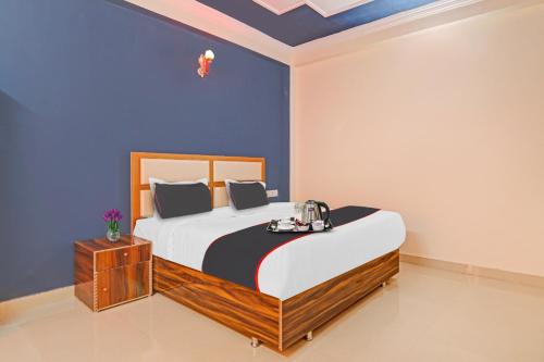 Collection O Sundaram Resort 객실 침대