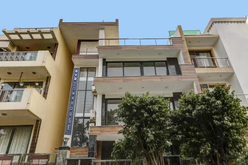 an image of an apartment building at OYO Townhouse 1071 Hotel Metro Inn Residency Near ISKCON Temple Noida in Indirapuram