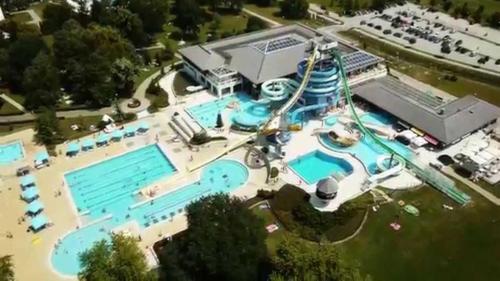 an overhead view of a large swimming pool at Holiday house VilAna in Puconci