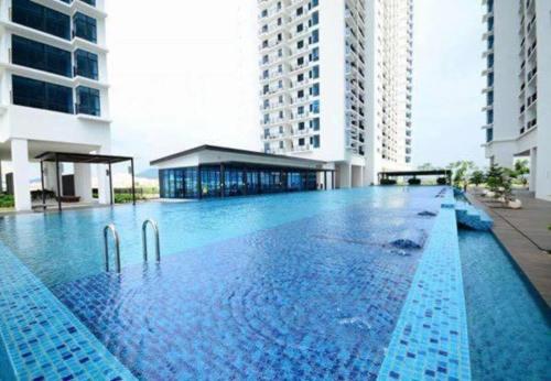 a large swimming pool in the middle of a building at 5Pax Studio-Bring Joy & Simplicity Into Life at Setia Alam by Verano in Shah Alam