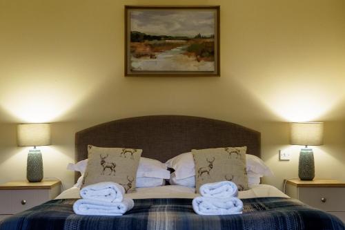 Katil atau katil-katil dalam bilik di Bachilton Farm Holidays