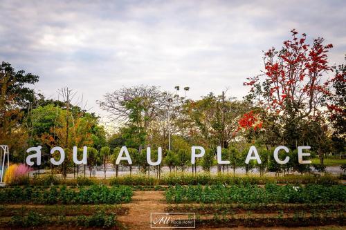 a sign for a garden in a park at AU Place Hotel in Loei