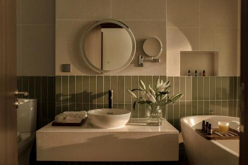 Ένα μπάνιο στο RUBENS BOUTIQUE HOTEL