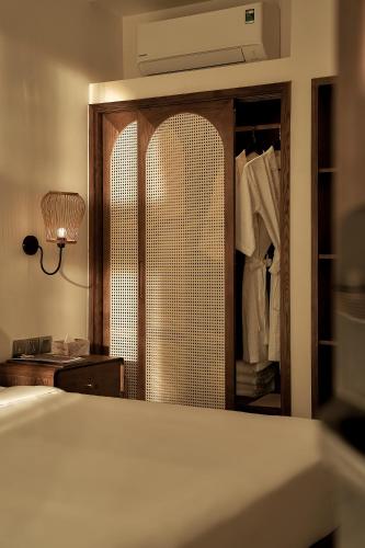 Ένα ή περισσότερα κρεβάτια σε δωμάτιο στο RUBENS BOUTIQUE HOTEL