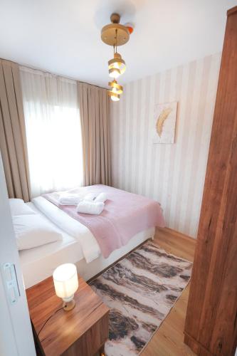 a bedroom with a bed and a window at Classic Suite SS5 in Istanbul