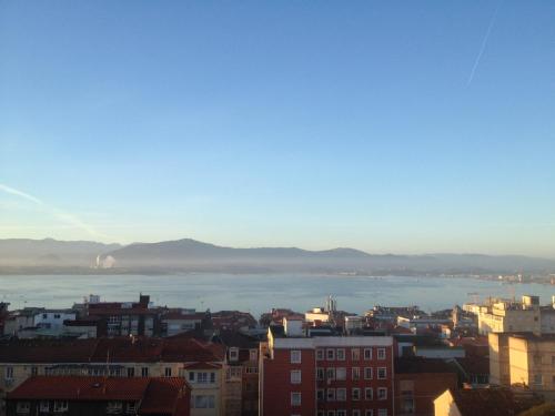 a view of a city with a body of water at Hotel Art Santander in Santander