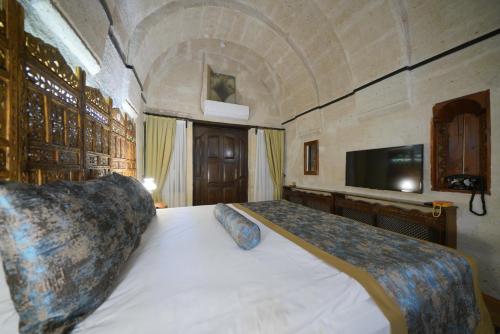 Mira Cappadocia Hotelにあるベッド