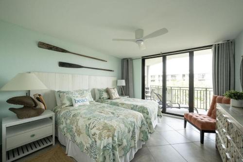 Voodi või voodid majutusasutuse Anchor Drop Key West toas