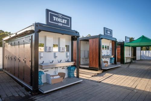 a couple of small buildings sitting next to each other at Wies'n Camp in Munich
