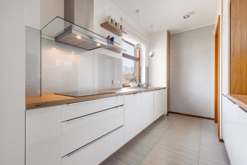 Kuchyň nebo kuchyňský kout v ubytování Liberty Premium by Baltica Apartments