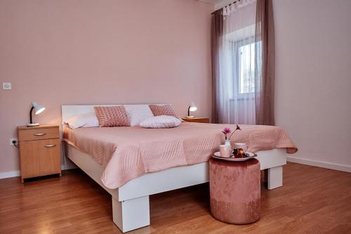 Postel nebo postele na pokoji v ubytování Rooms Emilija