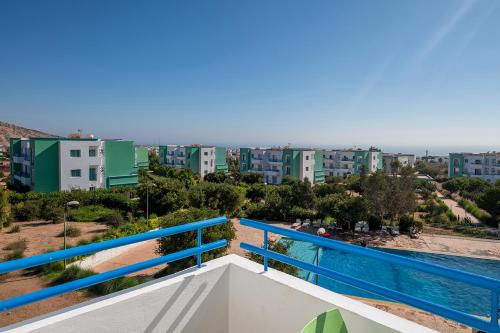 a balcony of a apartment with a view of the city at Lunja Village - Agadir in Taghazout