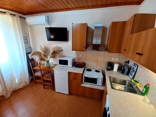 Kuchyň nebo kuchyňský kout v ubytování ML Saroko Apartment 2