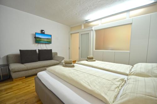 Ein Bett oder Betten in einem Zimmer der Unterkunft Apartment Zeller Lake & City Centre