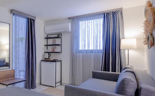 Area soggiorno di The Easy Rooms Verandah