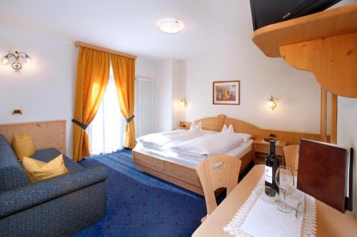 Ένα ή περισσότερα κρεβάτια σε δωμάτιο στο Hotel Else