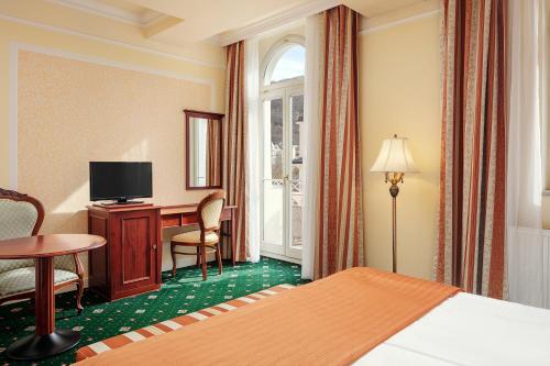 Postel nebo postele na pokoji v ubytování Humboldt Park Hotel & Spa