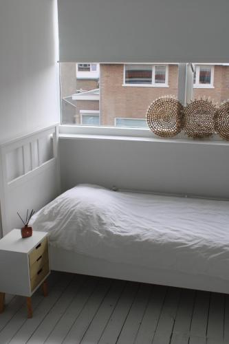 Ein Bett oder Betten in einem Zimmer der Unterkunft Salman Beach House