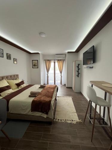 Postel nebo postele na pokoji v ubytování Apartman S2
