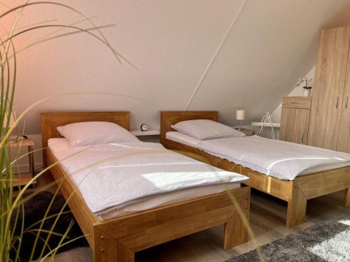Postel nebo postele na pokoji v ubytování Ferienwohnung Claßen