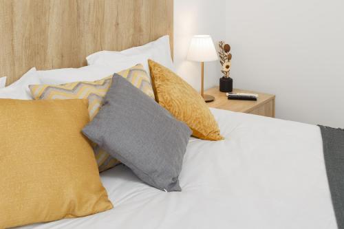 Ένα ή περισσότερα κρεβάτια σε δωμάτιο στο LUMO Apartment Fátima