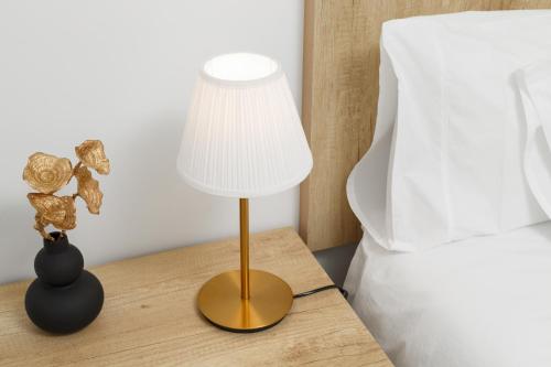 Ένα ή περισσότερα κρεβάτια σε δωμάτιο στο LUMO Apartment Fátima