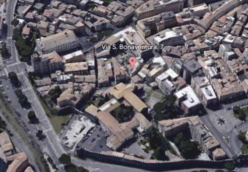 an aerial view of a city with a red circle at Guest House LT San Bonaventura Apartments colazione inclusa convenzione con impianti termali in Viterbo