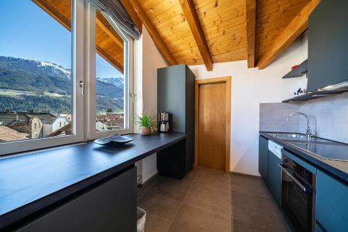 Kuchyň nebo kuchyňský kout v ubytování Apartment Luisa