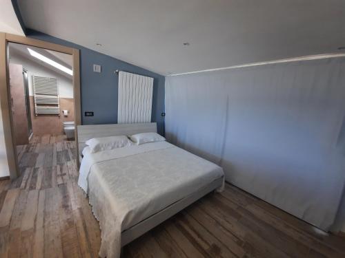 Ένα ή περισσότερα κρεβάτια σε δωμάτιο στο House Tempa la pera
