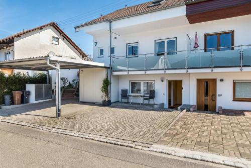 a house with a patio in front of it at Ferienwohnung Gernsbach in Gernsbach