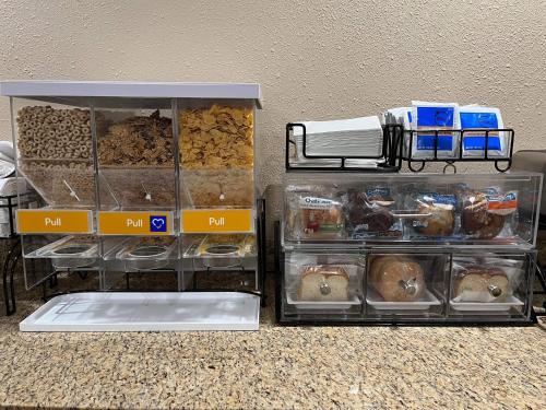 a display of different types of food in plastic containers at Quality Inn & Suites Bradford in Bradford