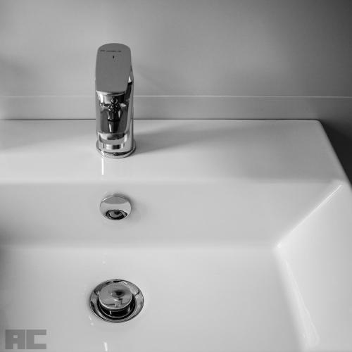 a white sink with a faucet on top of it at B&Belvedere, affittacamere in San Benedetto del Tronto