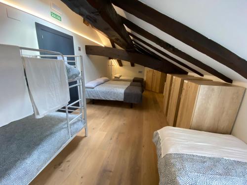 Llit o llits en una habitació de Albergue turístico de Eugi