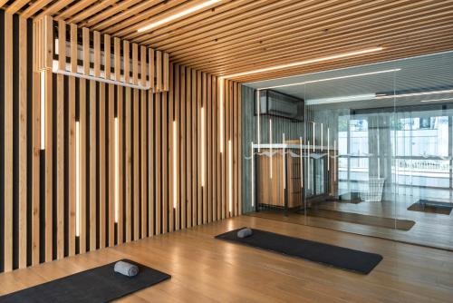 a room with two yoga mats on a wooden floor at Andaz Condesa Mexico City, By Hyatt in Mexico City