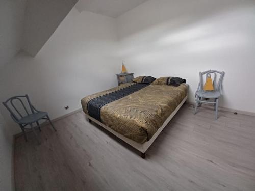 Posteľ alebo postele v izbe v ubytovaní Aux portes de Beauval
