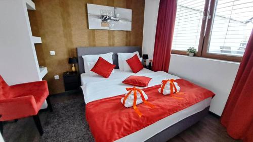 Arcobaleno Apartments & Roomsにあるベッド