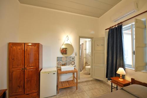 Koupelna v ubytování Delfini Hotel