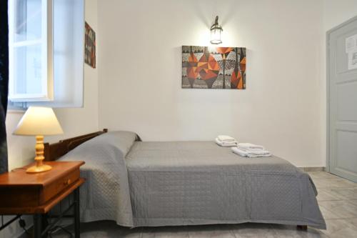Ein Bett oder Betten in einem Zimmer der Unterkunft Delfini Hotel