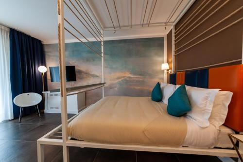 Posteľ alebo postele v izbe v ubytovaní Loriana Park Hotel Sul Lago