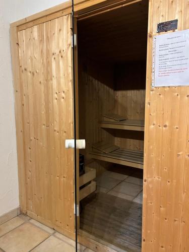 an open door to a room with a closet at Chalet Adonis - Montriond, Morzine, Avoriaz in Montriond