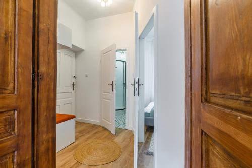 a hallway with a door leading to a bedroom at Heart of Center in Rzeszów