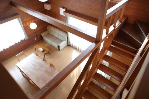 an overhead view of a living room with a staircase at Esashi-gun - Cottage - Vacation STAY 38366v in Pinneshiri