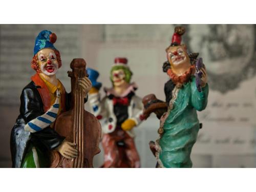 a group of clown figurines standing next to each other at Innterhill Tsubasa Yufuin - Vacation STAY 94225v in Yufuin