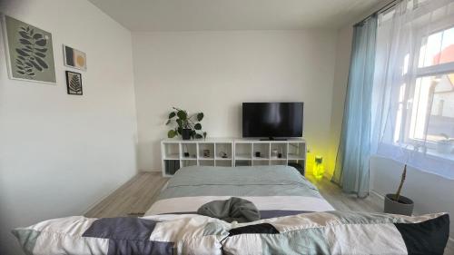 Postel nebo postele na pokoji v ubytování Fara N°71 APART 1