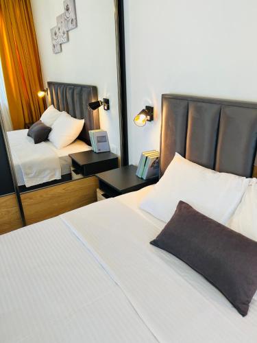 Una cama o camas en una habitación de Kovacevic Apartments