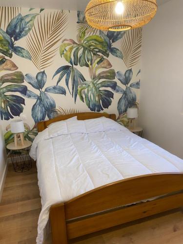 Postel nebo postele na pokoji v ubytování Villa Les Sables