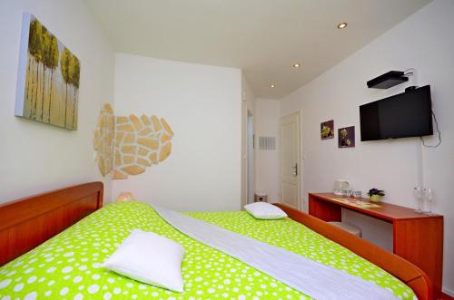 Llit o llits en una habitació de Villa Capo