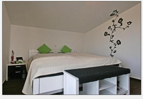 Dünenhotel Borkumにあるベッド