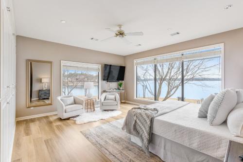 a bedroom with a bed and a large window at Ledgerwood Point in Hot Springs